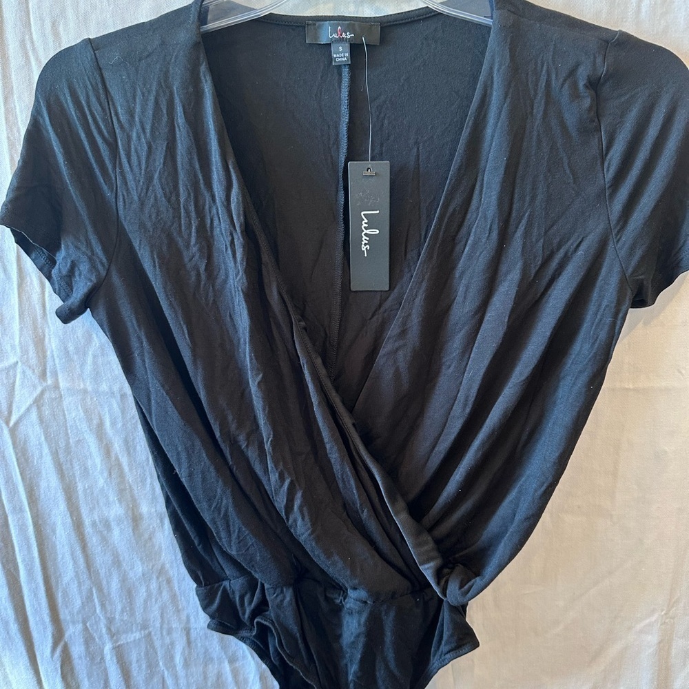Lulus Marren Black Short Sleeve
Surplice
Bodysuit Brand New With Tag Sz
Small